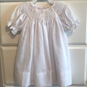 Smocked white baby girls dress
